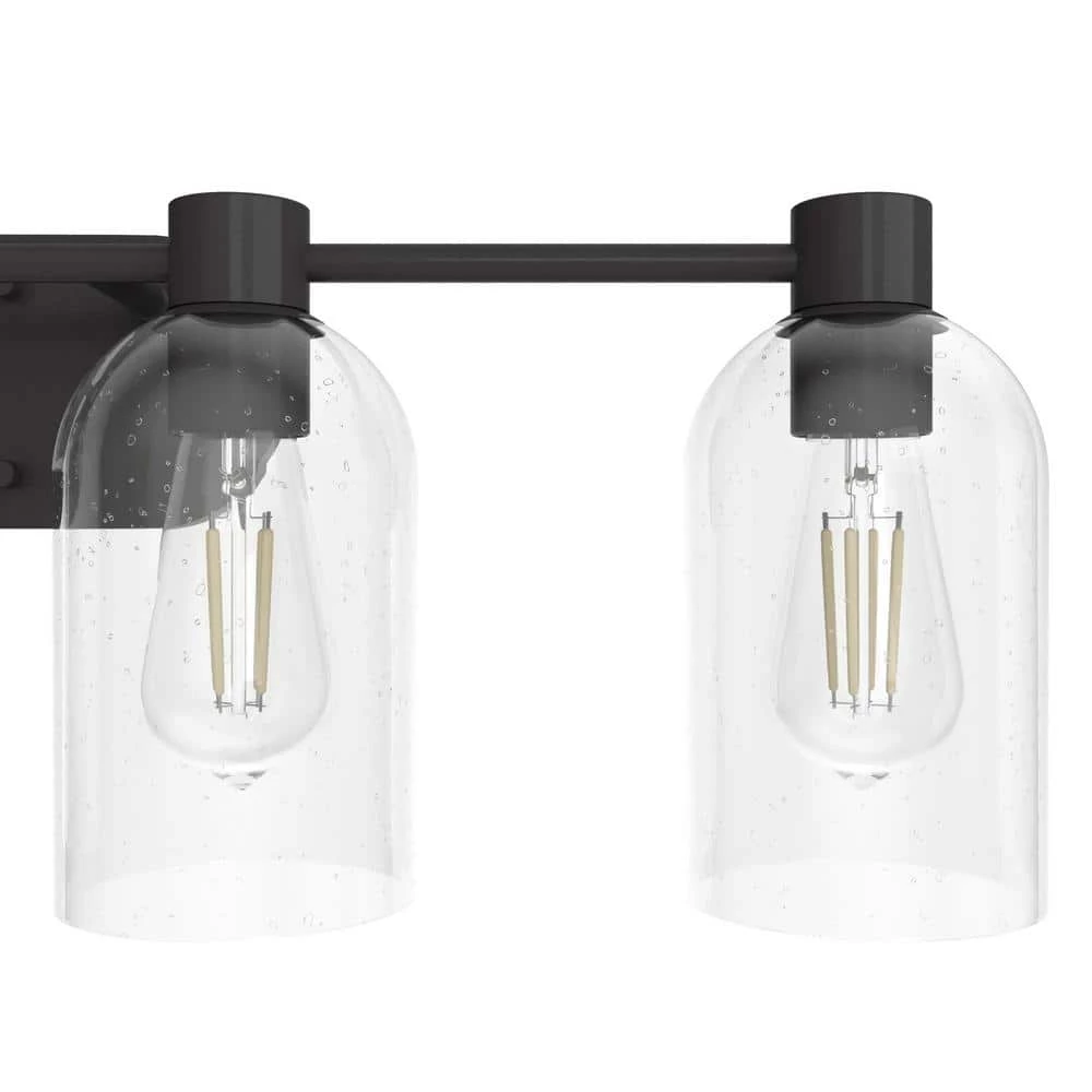 Lochemeade 28.5 in. 4 Light Noble Bronze Vanity Light with Clear Seeded Glass Shades Bathroom Light by Hunter 6 Lochemeade 28.5 in. 4 Light Noble Bronze Vanity Light with Clear Seeded Glass Shades Bathroom Light by Hunter - Image 4