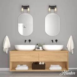 Lochemeade 12.5 in. 2 Light Noble Bronze Vanity Light with Clear Seeded Glass Shades Bathroom Light by Hunter 12 Lochemeade 12.5 in. 2 Light Noble Bronze Vanity Light with Clear Seeded Glass Shades Bathroom Light by Hunter -Hunter Sales noble bronze hunter vanity lighting 19780 40 1000